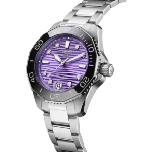 TAG Heuer Aquaracer Professional 300 36mm Ladies Watch Purple.BA0618Elegant and resilient, the TAG Heuer Aquaracer Professional 300 Date pairs a purple wavy-patterned dial with diamond indexes. This high-performance dive watch, water-resistant to 300 meters and featuring a versatile steel 3-row bracelet, seamlessly blends style with the grit needed to conquer ocean depths. Ref. WBP231M